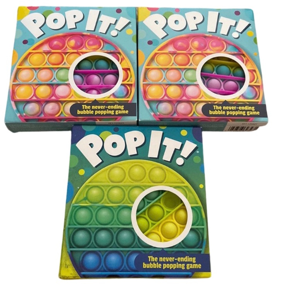 3 pack POP IT! Brand new in box. 2 rainbows, 1 green.